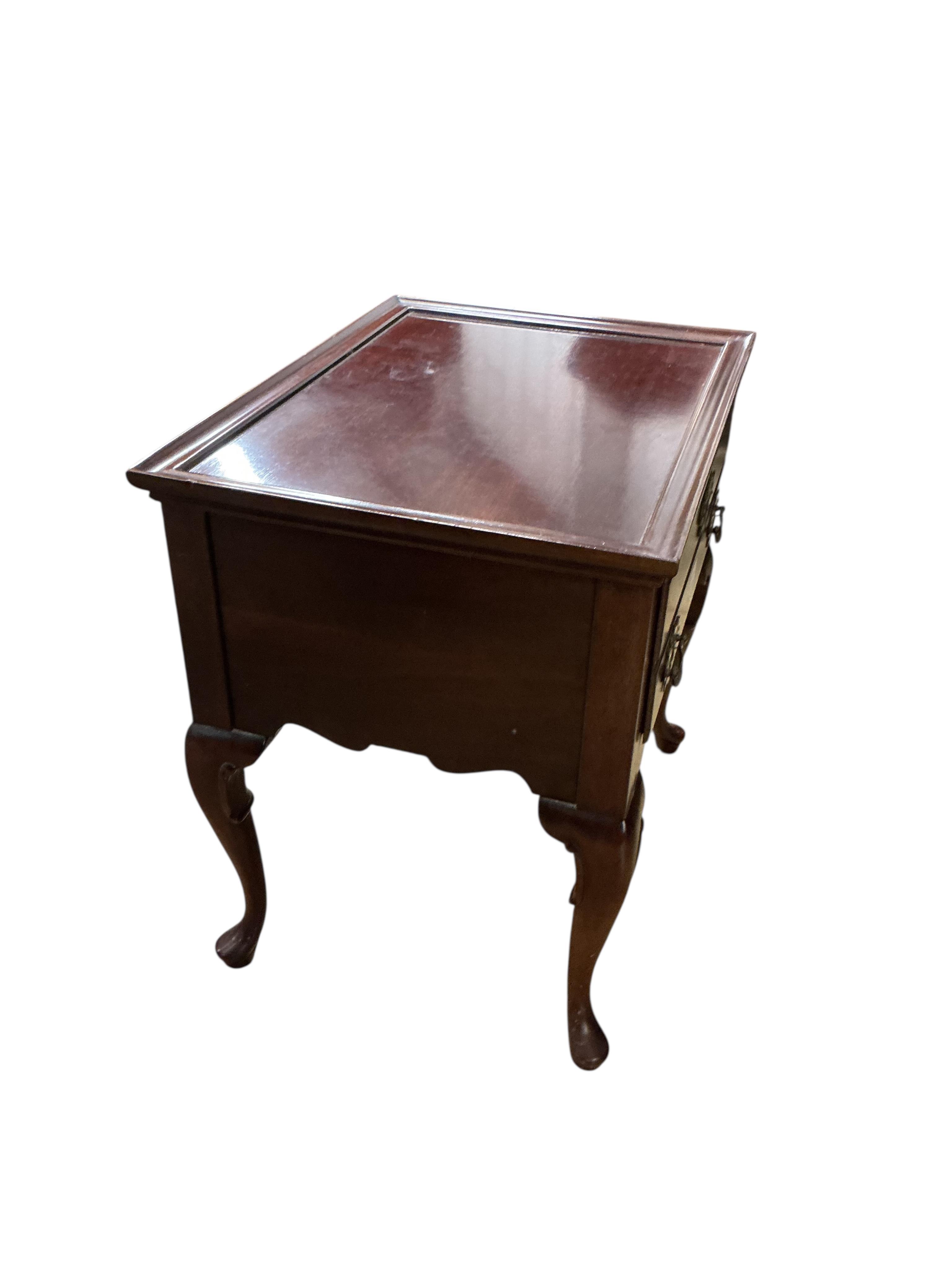 A George III mahogany lowboy, fitted with a single drawer, width 61cm, depth 46cm, height 61cm